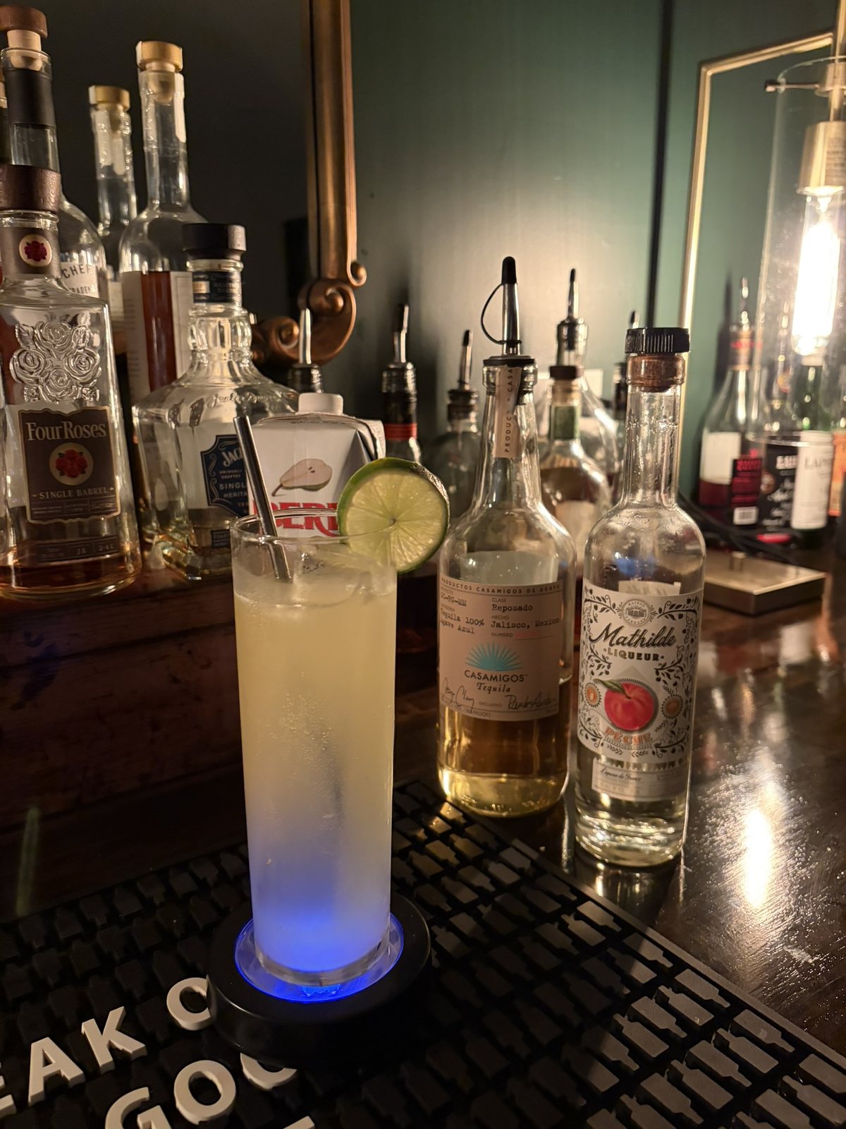 Fresh margarita with lime wheel garnish served at a private event bar