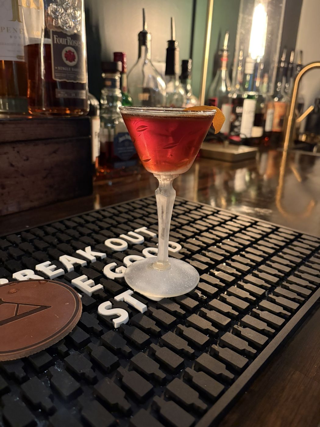 Signature cocktail garnished and plated