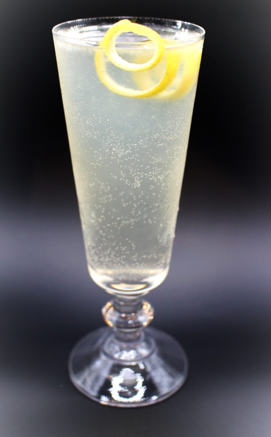 Elegant cocktail with a lemon twist garnish