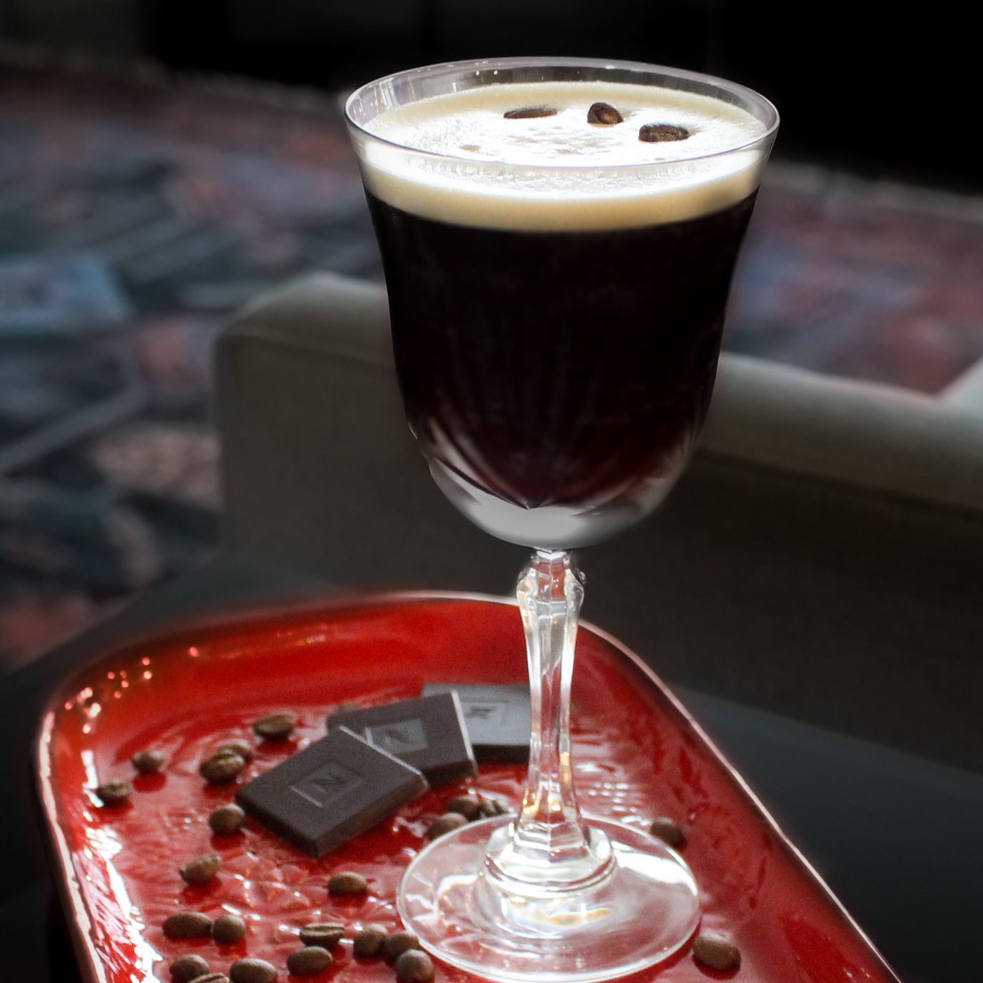 Espresso martini style cocktail with coffee bean garnish