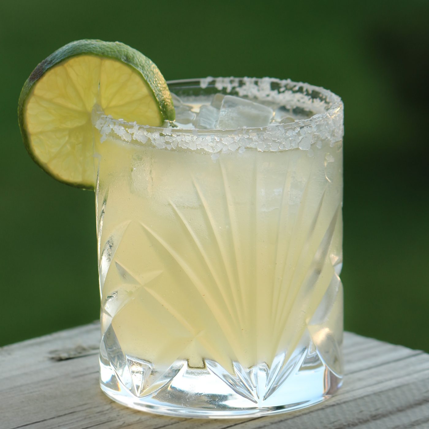 Fresh margarita-style cocktail with a lime wheel