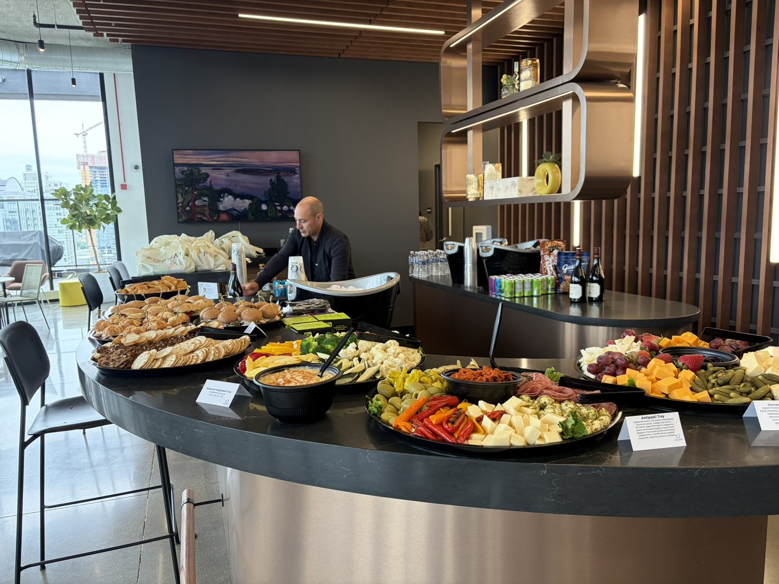Mobile bar and catering spread set up for a Chicago corporate happy hour