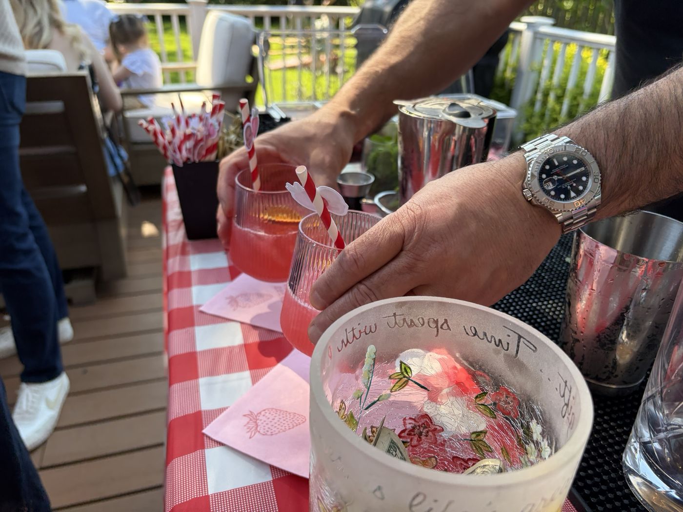 Guests toasting at a birthday party bar