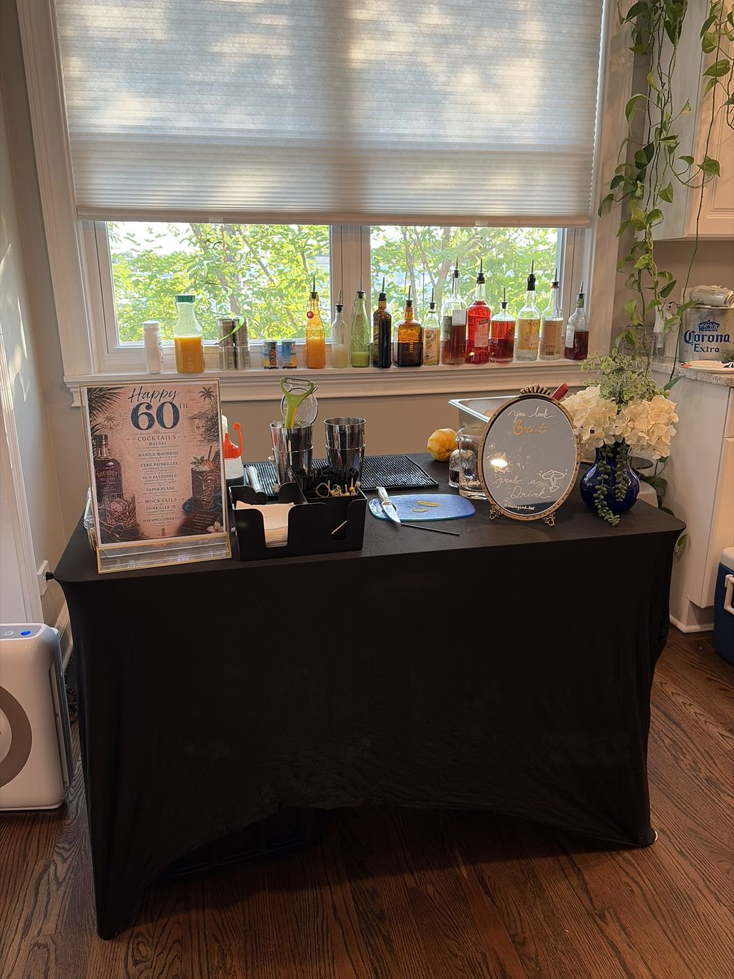 Birthday celebration bar setup with garnishes and glassware
